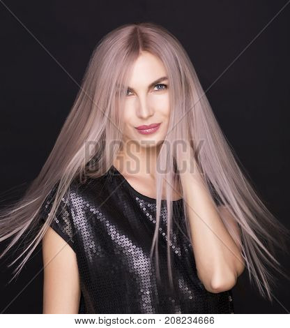 Photo of a young beautiful woman with magnificent purple hair