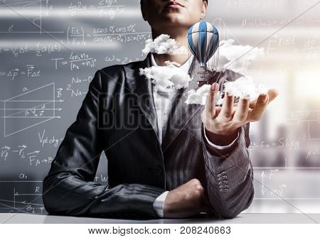 Closeup of business woman in suit presenting flying aerostate among clouds in her palm with business sketches on background. 3D rendering.