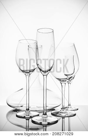 Glassware Selection With Wine, Champagne, Liquour Glasses And Decanter On The Light Background