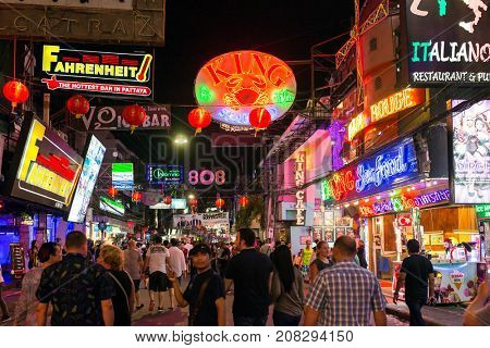 Pattaya, Thailand -March 6, 2017: Walking Street in Pattaya at night. The street is a tourist attraction primarily for night life and entertainment.