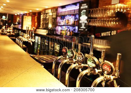 LONDON, UK - SEPTEMBER 21, 2017: Draft Beer in a traditional english pub