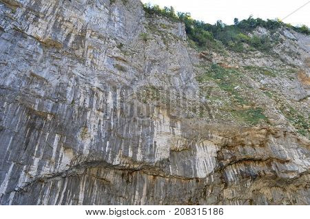 Steep wall in the valley of the mountains of the North Caucasus