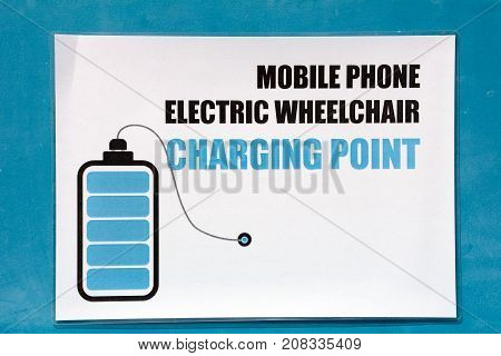 Mobile phone charging point sign in the harbour Birzebbuga Malta Europe.