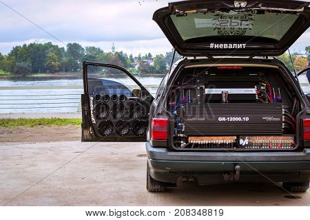 Saint-Petersburg Russia - September 30 2017: Pumped car VW Volkswagen Passat with music equipment amplifiers and speakers. Exhibition of car tuning music. Big Obukhovsky cable-stayed bridge