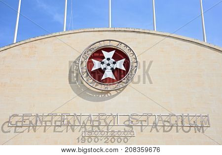 ATTARD, MALTA - APRIL 1, 2017 - Front view of the Centenary Stadium name and emblem Attard Malta Europe, April 1, 2017.
