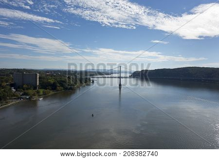 The Mid-Hudson Bridge spans across the Hudson River from Poughkeepsie to Highland New York.