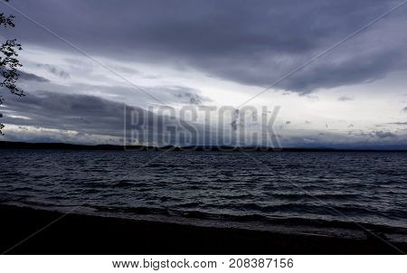gray cloudy sky over the lake, South Ural, Uvildy