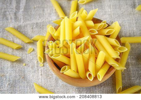 Penne Rigate. Macaroni In The Form Of Feathers. Mostaccioli Pasta