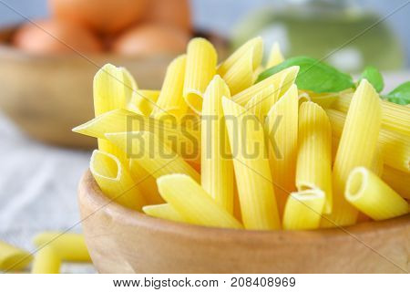 Penne Rigate. Macaroni In The Form Of Feathers. Mostaccioli Pasta