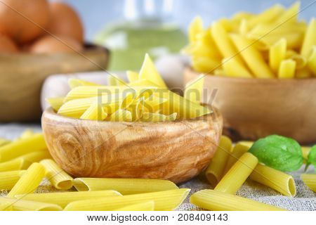 Penne Rigate. Macaroni In The Form Of Feathers. Mostaccioli Pasta