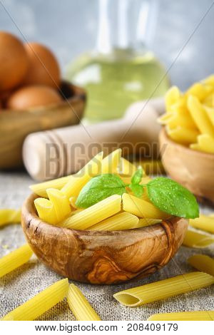 Penne Rigate. Macaroni In The Form Of Feathers. Mostaccioli Pasta