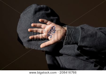 Abused Teen With Stop Hand Jesture