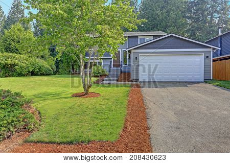 Lovely Grey Rambler House Exterior Features Grey Siding