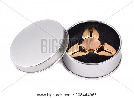 Metallic fidget spiner isolated on white background