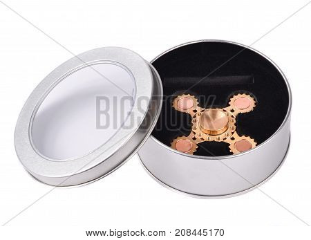 Metallic fidget spiner isolated on white background