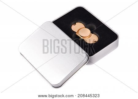 Metallic fidget spiner isolated on white background