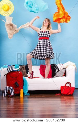 Woman Throwing Up Clothes, Clothing Flying Everywhere