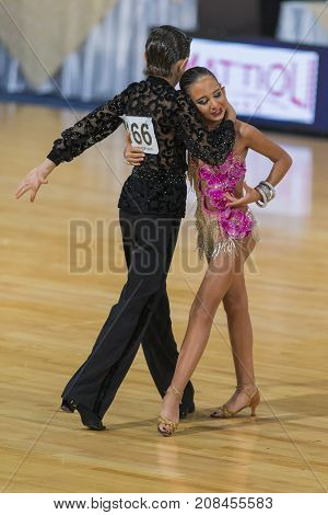Minsk Belarus-October 7 2017: Dance Couple Of Samadashvili Avtandil and Gogishvili Elene Performs Youth-2 Latin-American Program on WDSF International Capital Cup MinskOctober 72017 MinskBelarus.