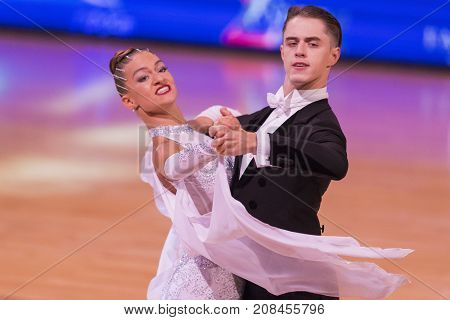 Minsk Belarus-October 7 2017: Dance Couple of Magdisyuk Andrey and Staricyna Nataliya Nataliya Performs Adults European Standard Program on WDSF International Capital Cup Minsk- 2017 in October 7 2017 in Minsk Belarus