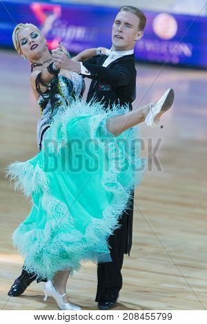 Minsk Belarus-October 7 2017: Dance Couple of Lioli Yury and Berestova Oxana Performs Adults European Standard Program on WDSF International Capital Cup Minsk- 2017 in October 7 2017 in Minsk Belarus.