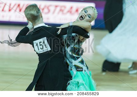 Minsk Belarus-October 7 2017: Dance Couple of Lioli Yury and Berestova Oxana Performs Adults European Standard Program on WDSF International Capital Cup Minsk- 2017 in October 7 2017 in Minsk Belarus.