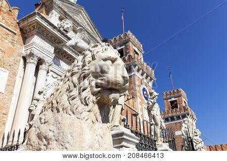 Venetian Arsenal old shipyard stone lion Venice Italy. Construction of the Arsenal began in the 12th century it was the largest industrial complex in Europe before the Industrial Revolution
