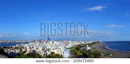 Panoramic view of Cijin Island beach and Kaohsiung City skyline