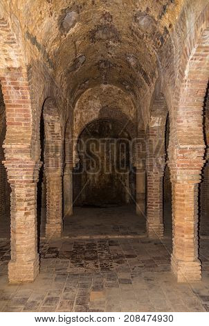 RONDA,SPAIN - SEPTEMBER 29,2017 - Columns in hammam (Banos Arabes) of Ronda. Ronda is a city in the Spanish province of Malaga.