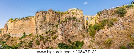 Panoramic view at the El Tajo gorge with bridge (Puente Nuevo)in Ronda - Spain