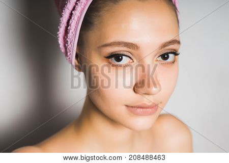 young girl with clean skin looks very good