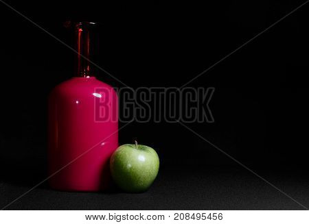 Interesting combination of color. Red and green on a dark background.