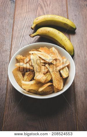 Stock Photo of Healthy Homemade Kela or Banana chips or wafers or Plantain Chips, selective focus