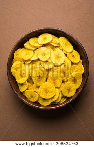Stock Photo of Healthy Homemade Kela or Banana chips or wafers or Plantain Chips, selective focus