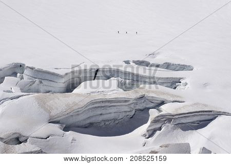 Glacier crevasses and seracs in a snow field in the Mont Blanc area.