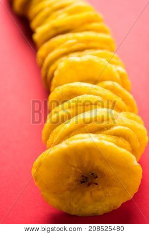 Stock Photo of Healthy Homemade Kela or Banana chips or wafers or Plantain Chips, selective focus