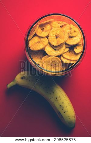 Stock Photo of Healthy Homemade Kela or Banana chips or wafers or Plantain Chips, selective focus