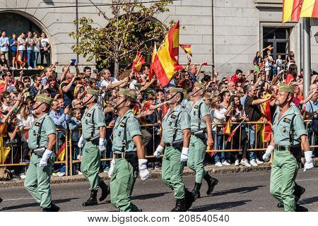 Madrid Spain - October 12 2017: Legionarios marching in Spanish National Day Army Parade. Several troops take part in the army parade for Spain's National Day.