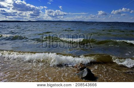 Noisy Wave Is Incident On The Shore Of The Lake