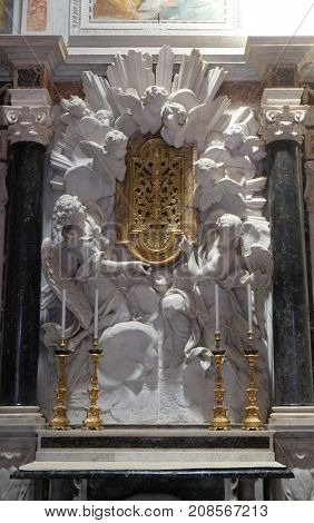 LUCCA, ITALY - JUNE 03: Altar in Chapel Cenami, high relief of Giovanni Baratta, Basilica of San Frediano, Lucca, Tuscany, Italy on June 03, 2017.