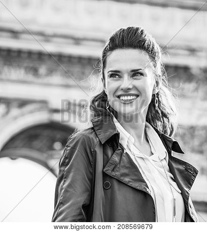 Happy Young Trendy Woman In Paris, France Looking Aside