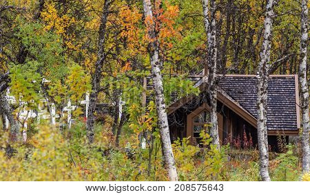 BJORKLIDEN, SWEDEN ON SEPTEMBER 13. View of a small Chapel, worship next to the Navvy Cemetery on September 13, 2017 in Bjorkliden, Sweden. Autumn, fall. Editorial use.