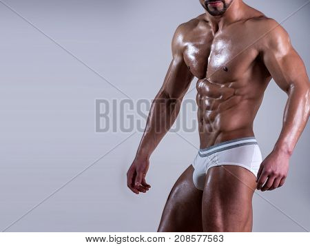 Sexy Male Model After Workout In Underwear. Half Naked Sexy Body Of Muscular Athletic Sportsman. Per