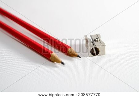 A Studio Photograph of some Pencils and a Pencil Sharpener