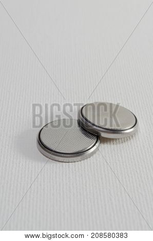A Close-up Studio Photograph of Button Cell Batteries CR2032