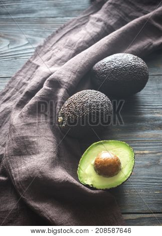 Hass Avocados On The Wooden Background