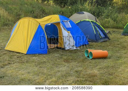 Camping tent in nature on a clear day