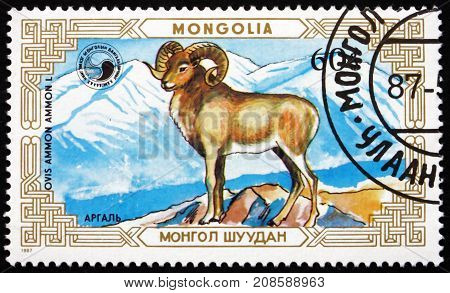 MONGOLIA - CIRCA 1987: a stamp printed in Mongolia shows Mountain Sheep in the Mountains Ovis Ammon Wild Sheep circa 1987