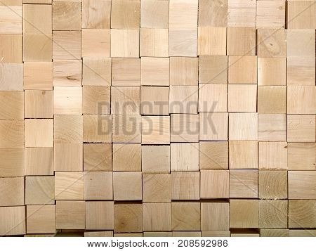 Many pieces of wood most likely waste from the main product in the form of cubes of wood