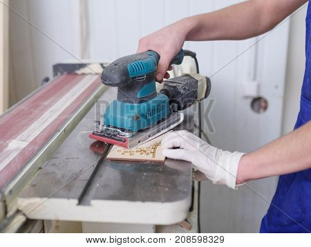 A carved plate on which the patterns and inscriptions are burned out which the master processes with a special tool