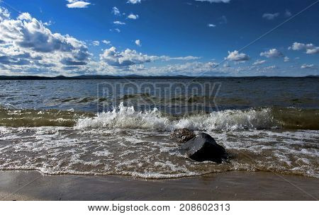 Noisy Wave Is Incident On The Shore Of The Lake